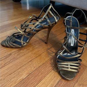 Manolos. Gold/bronzish in color. Bought at a Bergdorff sale.